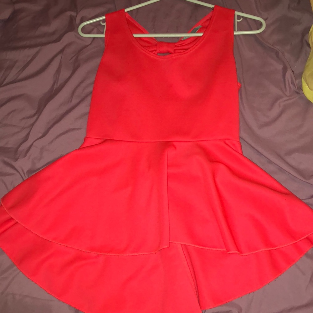 bright pink peplum shirt